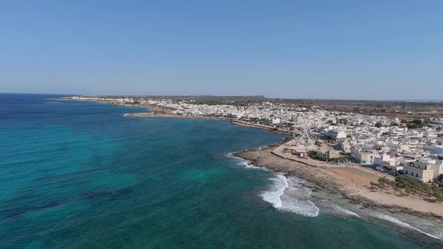 Torre San Giovanni is renowned for its long white beaches of incredible beauty and quality combined with a particularly light blue and transparent sea with shallow waters for very long stretches