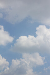 
Blue sky with puffy clouds
