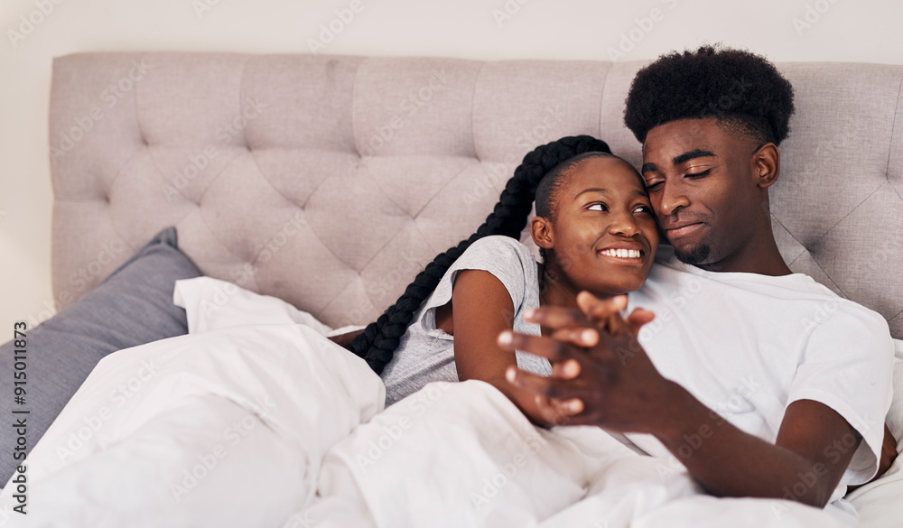 Wall mural Happy, black couple and relax with love in bedroom of hotel for weekend getaway, romantic connection and bonding. Man, woman and together in motel for dating anniversary, embrace and holding hands.