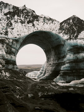 Ice Cave opening in glacier park on a misty day