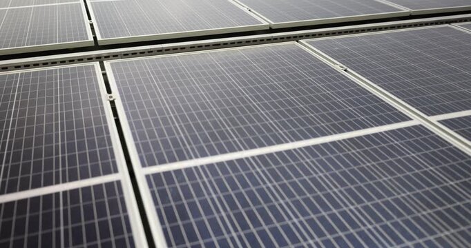 Expansive array of sleek solar panels arranged in rows. Designed to maximize sunlight absorption and enhance overall energy efficiency