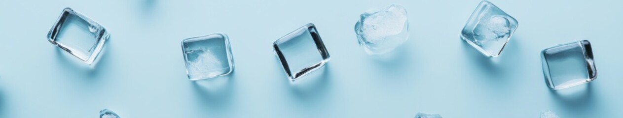 Refreshing Icebergs Adrift on a Light Blue Background, Exemplifying Cool Serenity Ideal for Summer and Beverage Themes