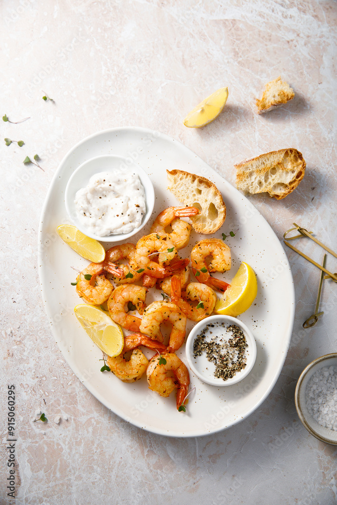 Wall mural Roasted shrimps with lemon and truffle mayo