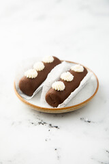 Homemade cocoa dessert with vanilla cream