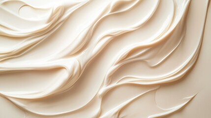 Soft, creamy texture of whipped frosting on a smooth surface with elegant swirls captured in natural light