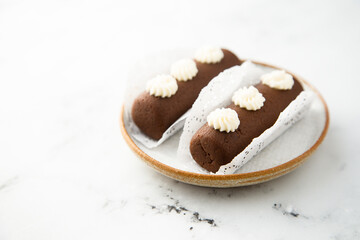 Homemade cocoa dessert with vanilla cream