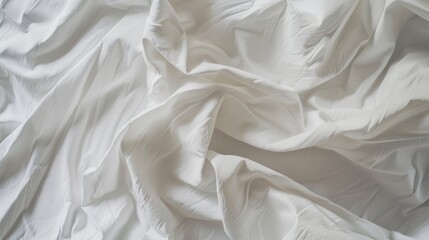Obraz premium Soft, white fabric draped in flowing, elegant folds, creating a serene and delicate texture.