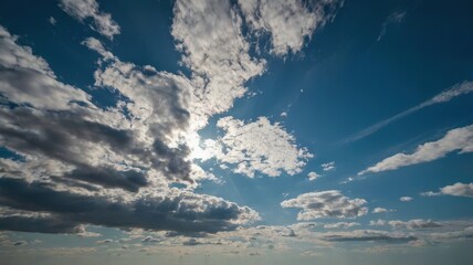 A fitting name for this image could be Bright Summer Sky with Fluffy Clouds