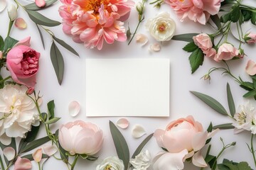 A delicate white card adorned with pink and white flowers