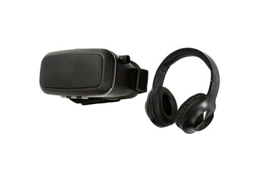 Black virtual reality glasses and headphones on isolated background. Accessory for vr games or...