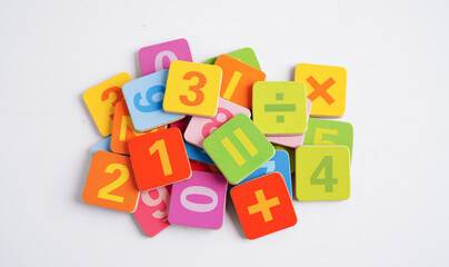 Number wood block cubes for learning Mathematic, education math concept.