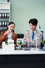 Engineer Teamwork Meeting, with partner on model building at company office working technology, Renewable energy-based green businesses and global warming.