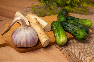 Preparation for fermenting fresh cucumbers by a process of pickling called lactic acid fermentation. 