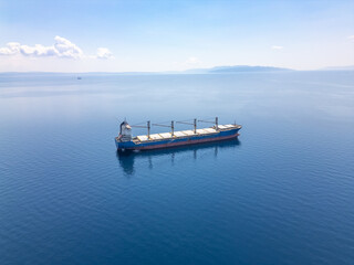Aerial view of transportation ship in the sea. Global business import and export logistic