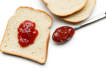 Slices of white bread with strawberry jam on white background. top view.