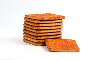 A stack of crackers with beef floss flavor. Isolated on white background. Perfect for design element, product packaging, promotion, or any commercial purposes.