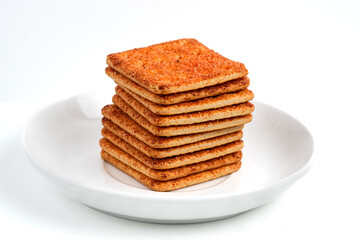 A stack of crackers with beef floss flavor. Isolated on white background. Perfect for design element, product packaging, promotion, or any commercial purposes.