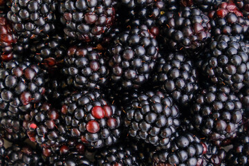 Bunch of tasty ripe blackberries as background, close up
