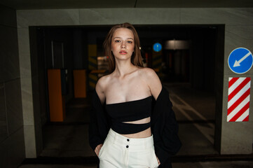 woman posing on the underground parking