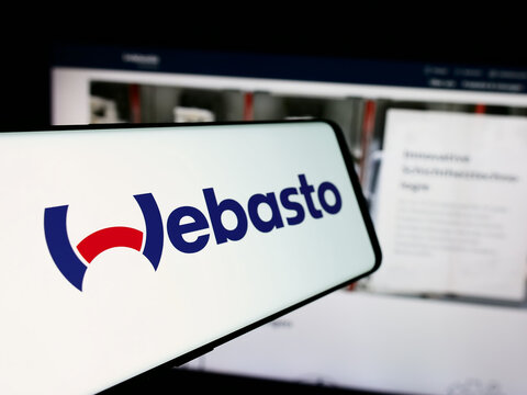 Stuttgart, Germany - 08-05-2024: Cellphone with logo of German automotive company Webasto SE in front of business website. Focus on left of phone display.