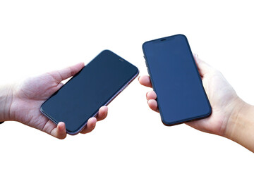 Isolated hands holding two cell phones with black screens held close together on a white background.