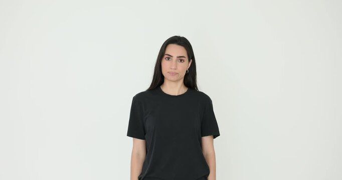 Distressed woman nods head with face etched with worry. Lady with loose hair reflects deep concern and unease with movements showing inner turmoil
