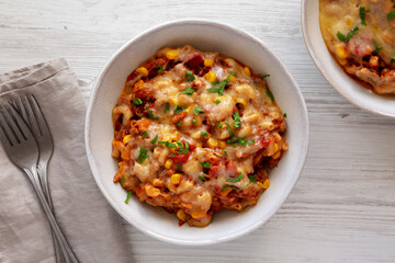 Homemade One-Pot Cheesy Taco Pasta in Bowls, top view. Overhead, flat lay, from above.
