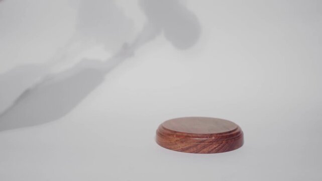 Man Stricking Gavel in Auction