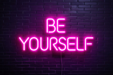 Stylish neon sign with word Be yourself on dark brick wall. AI