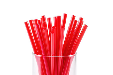 Vibrant Collection of Red Straws Displayed in a Clear Glass Vessel on a Bright Countertop on Transparent PNG Background.