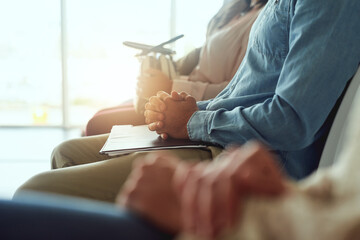 Interview, hands and anxiety in waiting room for business, career opportunity and job offer in office. Recruitment, candidates and patience in lobby for onboarding, hiring and application at agency