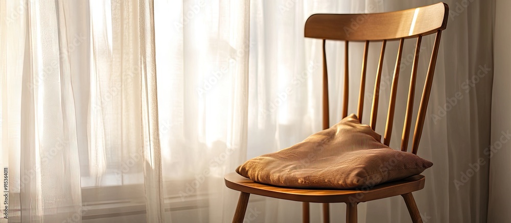 Poster light brown silk cushion of a wooden chair. with copy space image. place for adding text or design