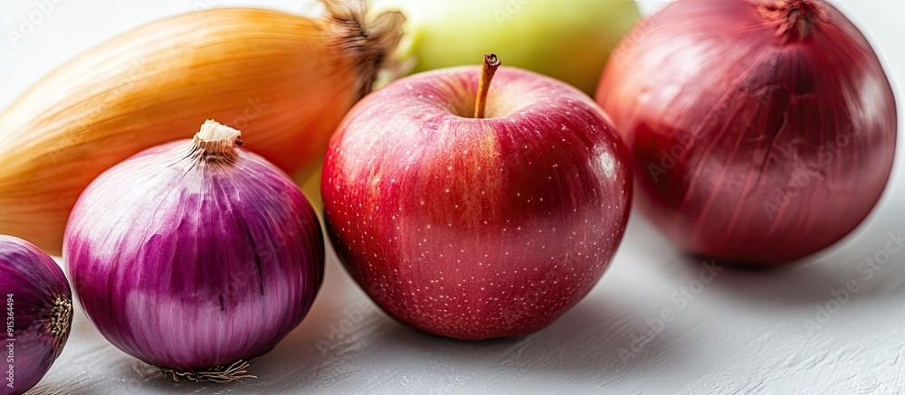 Poster image of an apple and onions on a white background. with copy space image. place for adding text or 