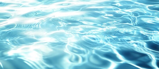 Water with ripples against a blue background. with copy space image. Place for adding text or design