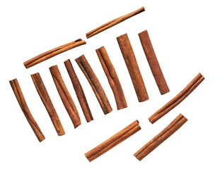 cinnamon sticks isolated on white background, top view.