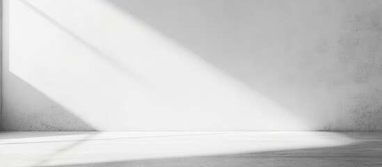 White blank sheet on a light gray textured cement or concrete wall background Copyspace Mockup or template for contemporary design with copyspace