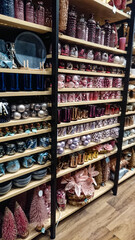 Shelf with New Year's toys and Christmas decorations. Sale of Christmas decorations. Beautiful decorations. Buying decorations