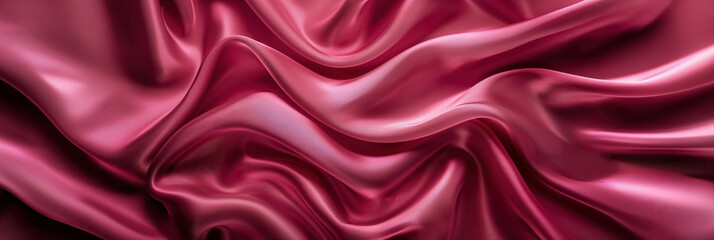 Close-up of flowing pink satin fabric, showcasing its smooth texture and elegant drape, creating a sense of luxury and beauty.