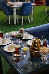 Afternoon Tea on Glass Table With Snacks