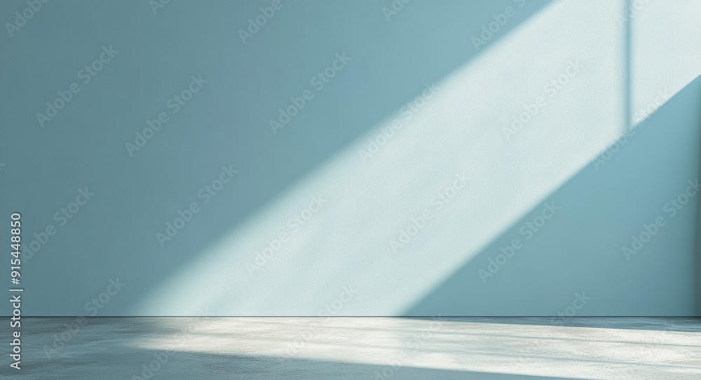 Poster light blue abstract background with shadows and light from windows on plaster wall.