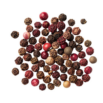 A scattering of colorful peppercorns, including black, white, green, and red peppercorns.