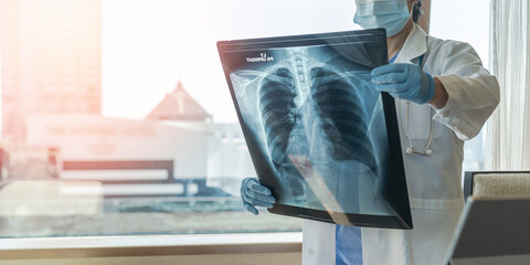 Doctor diagnosing patient’s health on asthma, lung disease, COVID-19 or bone cancer illness with...