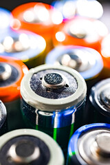Different alkaline batteries. Chemical waste