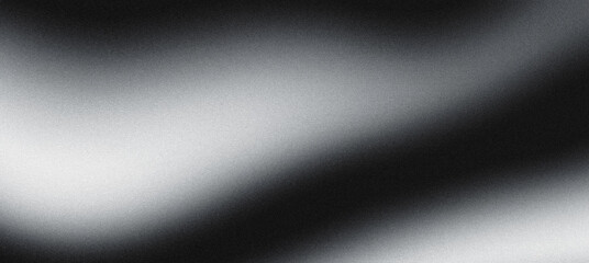 Grainy texture forming a black and white gradient on abstract background