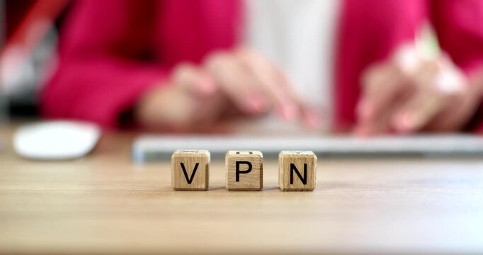 Programmer working at computer using application vpn closeup 4k movie slow motion. Protected internet access concept