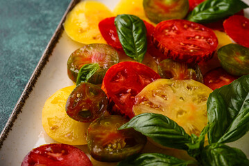 Different sort of sliced ripe tomatoes