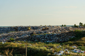 A large accumulation of garbage. Trash piles in landfill. Environment pollution.