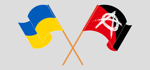 Crossed and waving flags of Ukraine and Anarchy