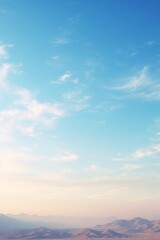 Fototapeta premium Serene landscapes with mountains and clear blue skies on sunny days.