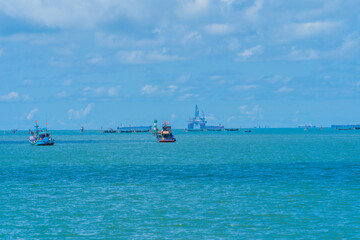 Panoramic coastal Vung Tau view, with waves, coastline, streets, coconut trees and Tao Phung mountain in Vietnam. Travel concept
